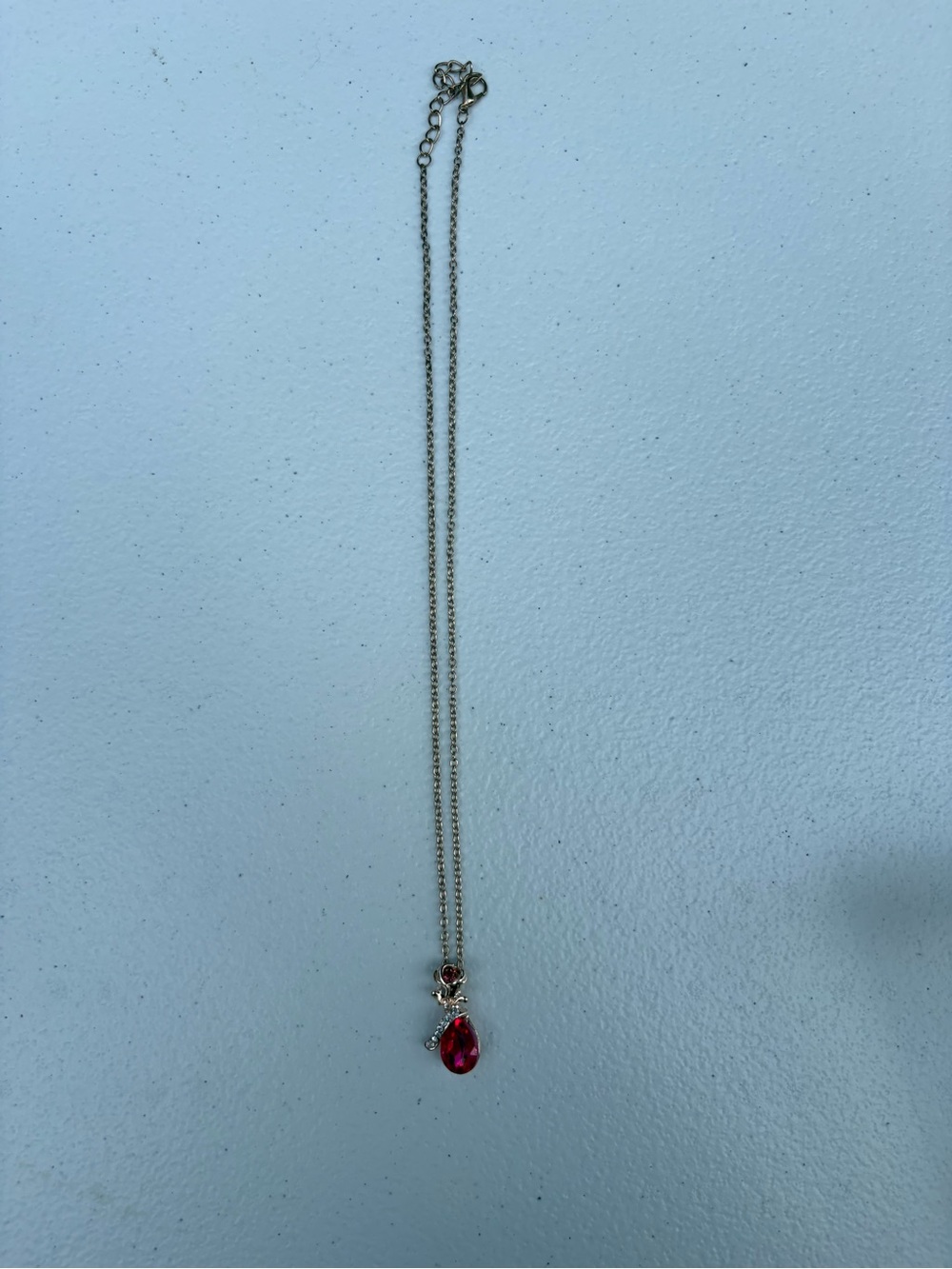 Delicate gold Necklace with Red Teardrop Pendant